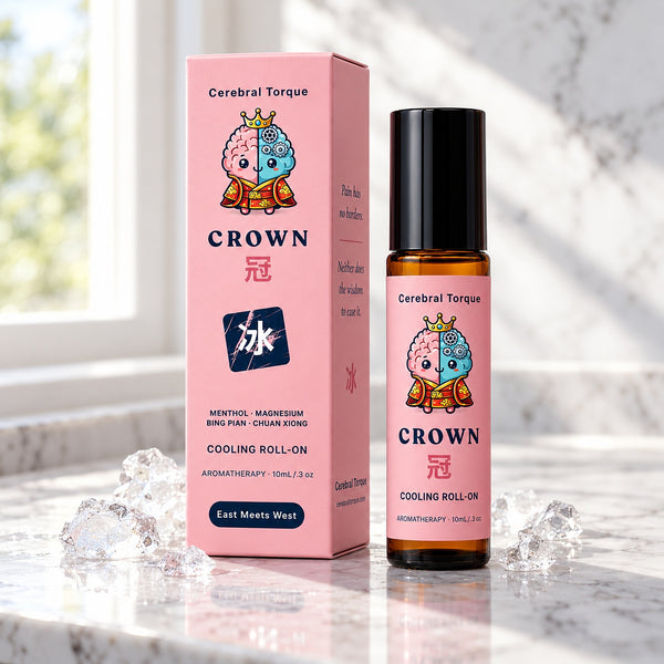 CROWN Cooling Roll-On for migraine and headache by Cerebral Torque: 10 mL amber roller and pink box on a white marble counter with ice